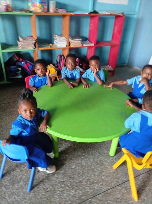 Early years pupils learning together in their classroom